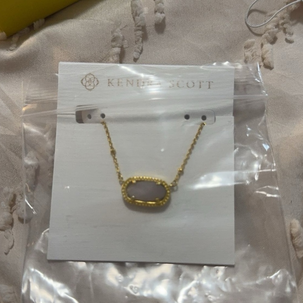 Kendra Scott light pink gem with gold chain